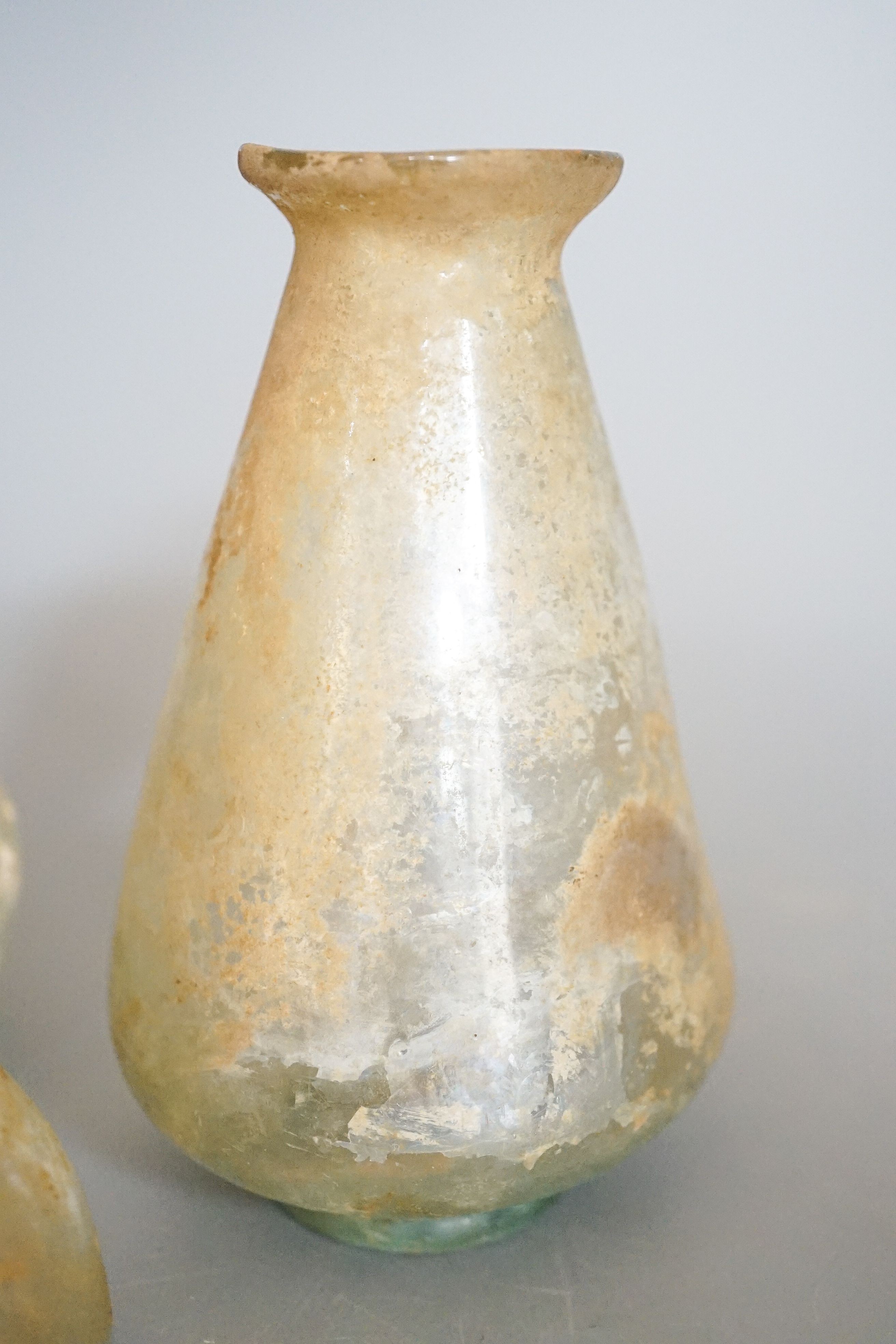 Three Roman glass vessels 14cm